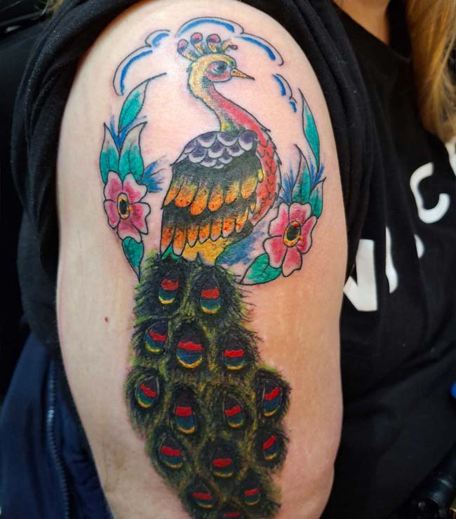 Coloured peacock tattoo